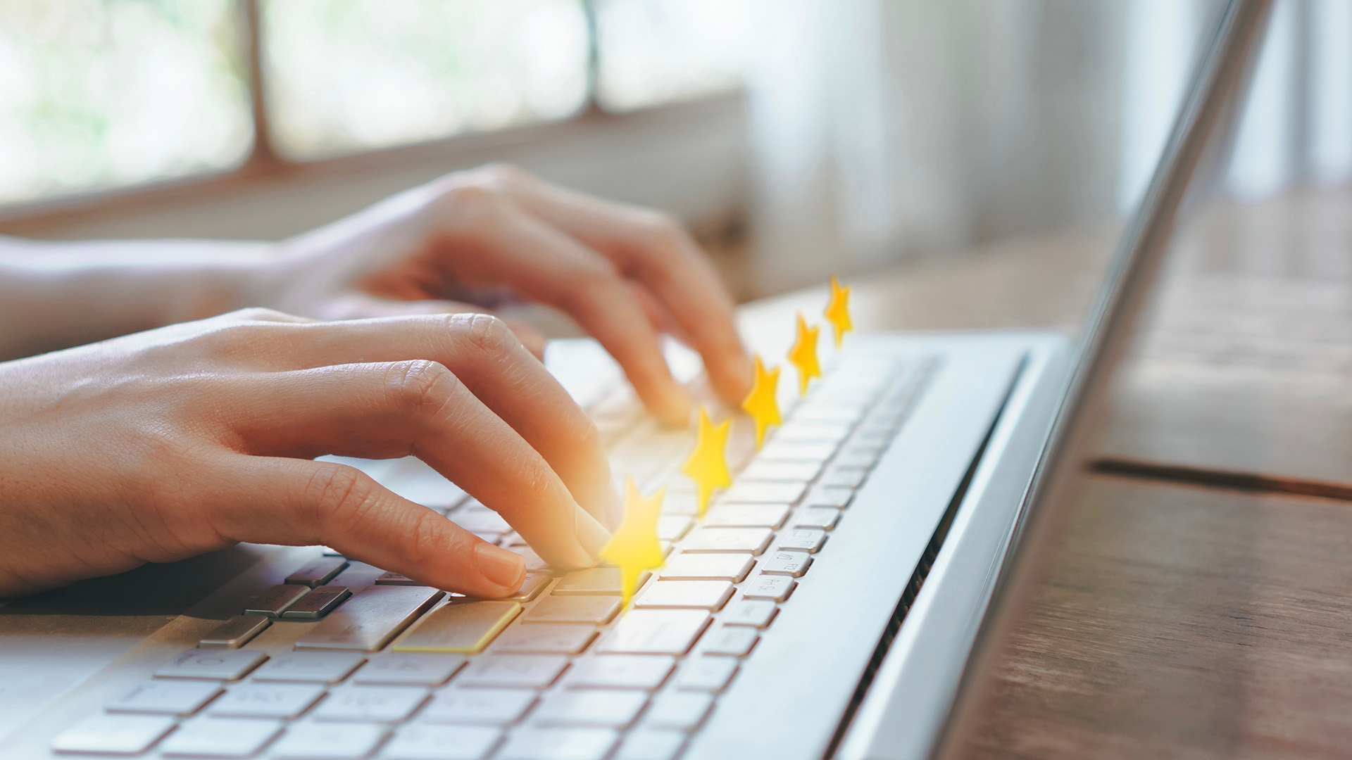 hands of girl using laptop for review online service,giving five stars with excellent grade,customer evaluation survey on internet